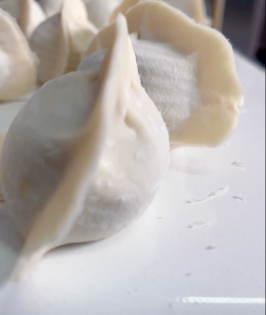 速凍餃子機(jī)做出來的餃子